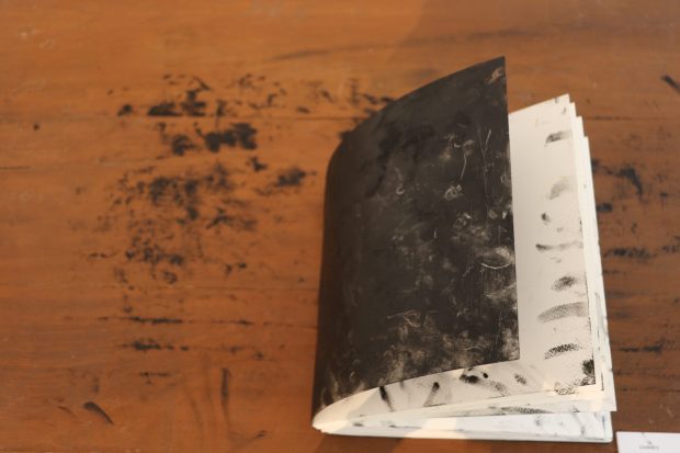 01. Sonam_Untitled II_Artists’ book_Kohl on acrylic_9” x 9” x 1_2015