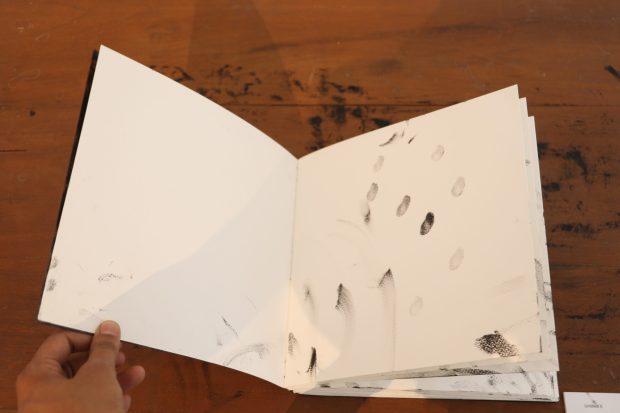 03. Sonam_Untitled II_Artists’ book_Kohl on acrylic_9” x 9” x 1_2015