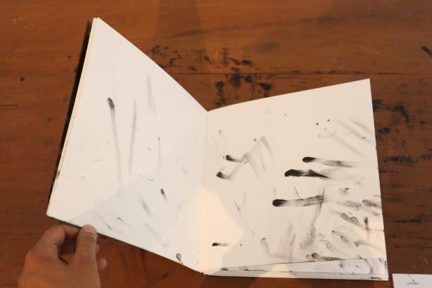 04. Sonam_Untitled II_Artists’ book_Kohl on acrylic_9” x 9” x 1_2015